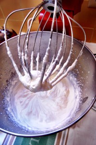 Soft peaks will form and whipped cream will hold to beater when ready